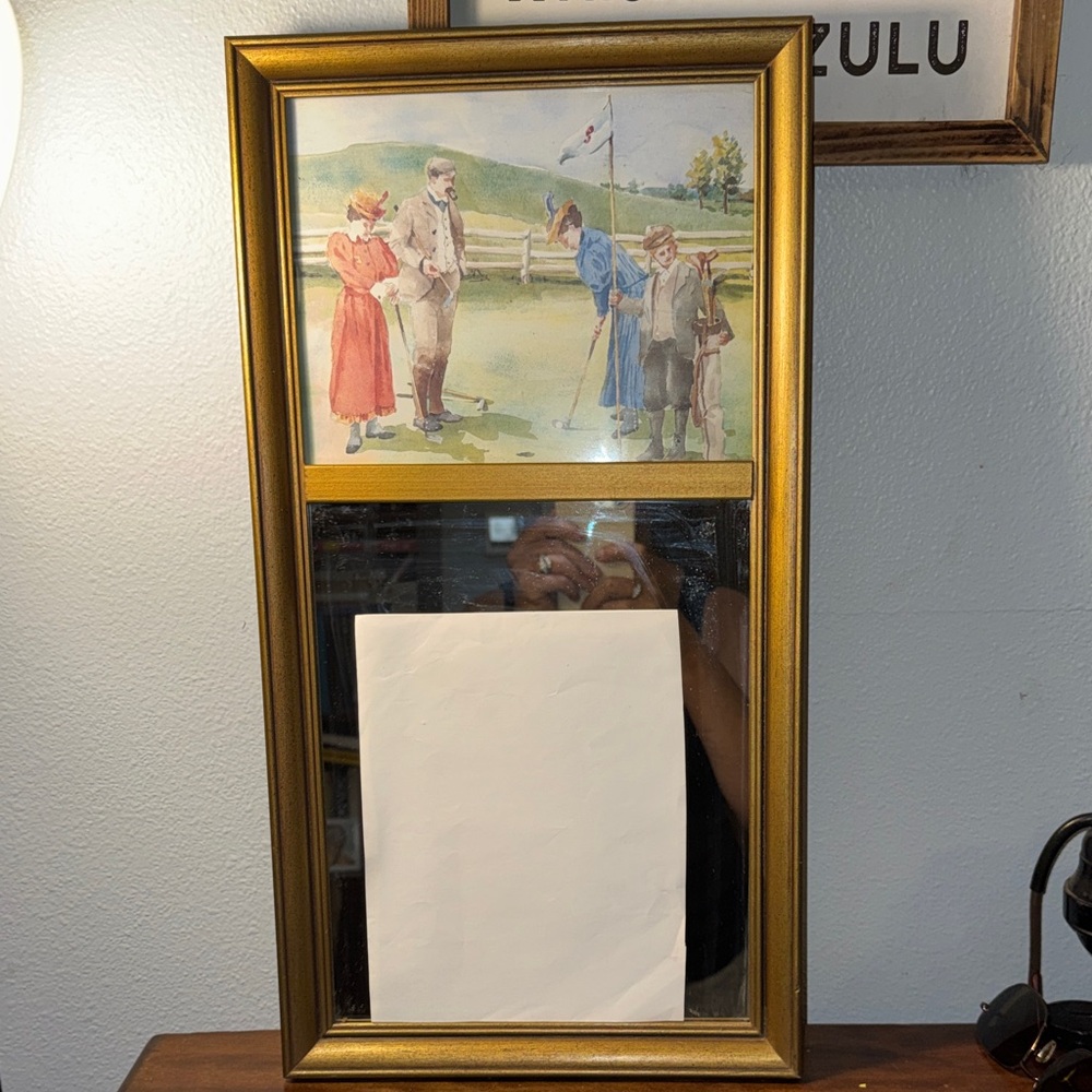 Vintage Golf Art Print Above a Mirror in a Decorative Gold Colred Frame